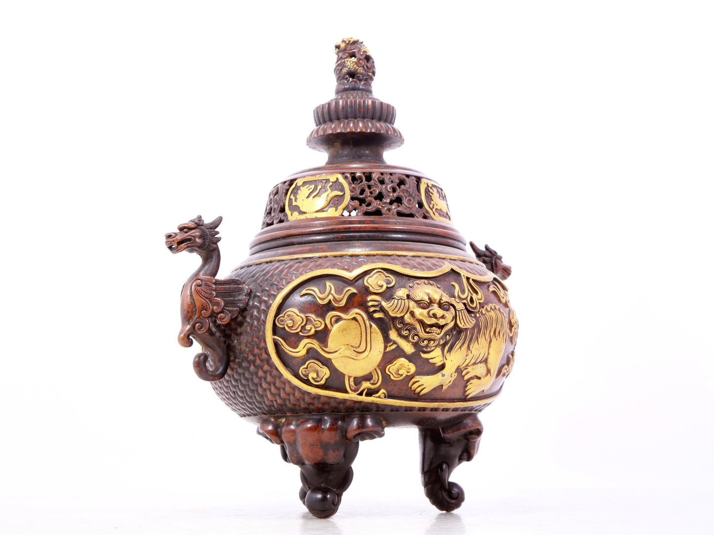 An exquisite gilt bronze censer with double ears and three legs with a lion and dragon pattern and a lid