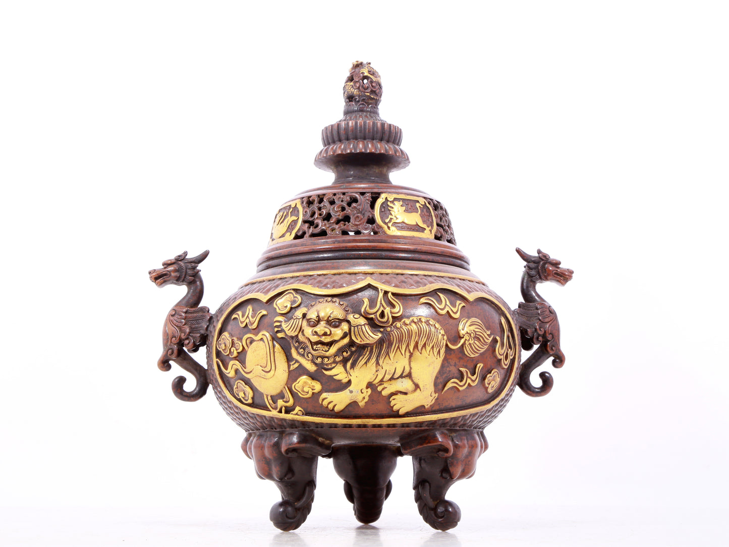 An exquisite gilt bronze censer with double ears and three legs with a lion and dragon pattern and a lid