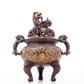 An exquisite gilt bronze censer with double ears and three legs with lotus and auspicious animal patterns.