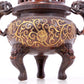 An exquisite gilt bronze censer with double ears and three legs with lotus and auspicious animal patterns.