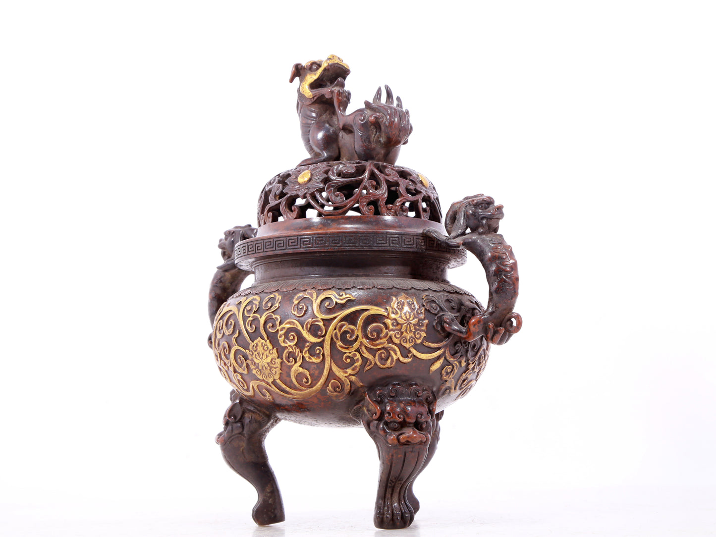 An exquisite gilt bronze censer with double ears and three legs with lotus and auspicious animal patterns.