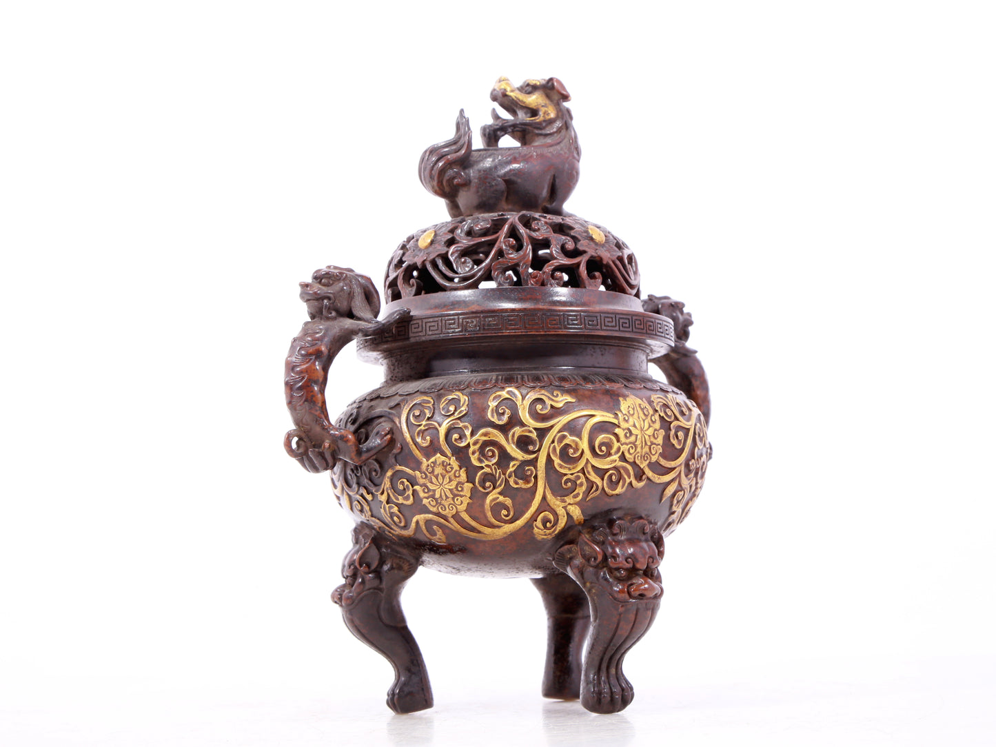 An exquisite gilt bronze censer with double ears and three legs with lotus and auspicious animal patterns.