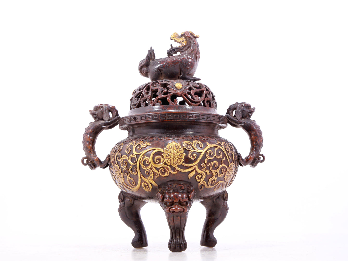 An exquisite gilt bronze censer with double ears and three legs with lotus and auspicious animal patterns.