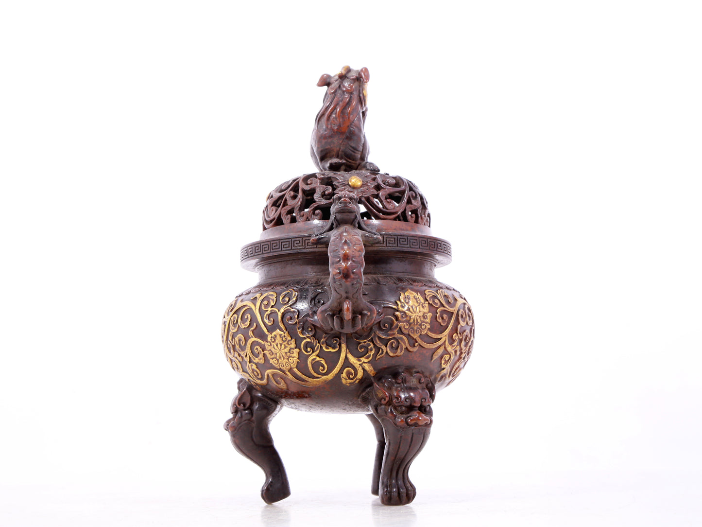 An exquisite gilt bronze censer with double ears and three legs with lotus and auspicious animal patterns.