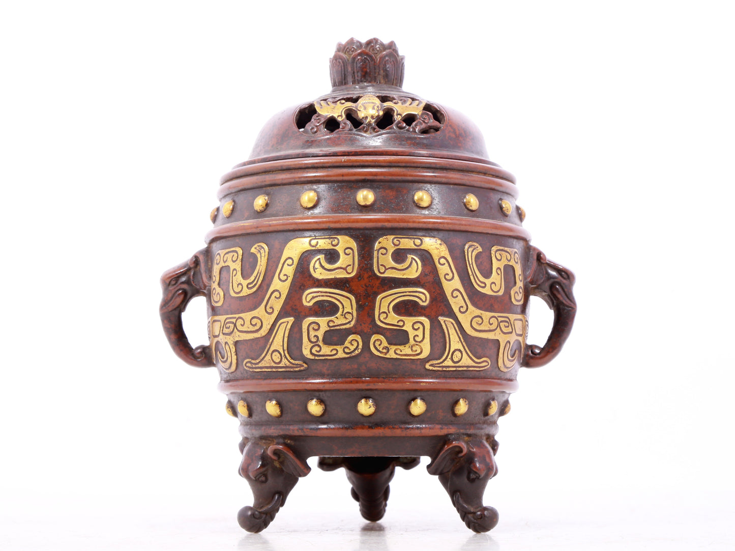 An exquisite gilt bronze dragon-patterned double-eared and tripod censer with lid