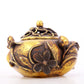 An exquisite gilt bronze censer with floral pattern and lid