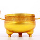 An exquisite gilt bronze censer with double ears and three legs