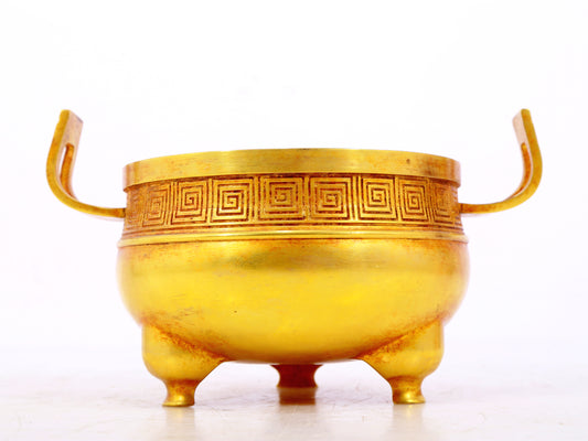 An exquisite gilt bronze censer with double ears and three legs