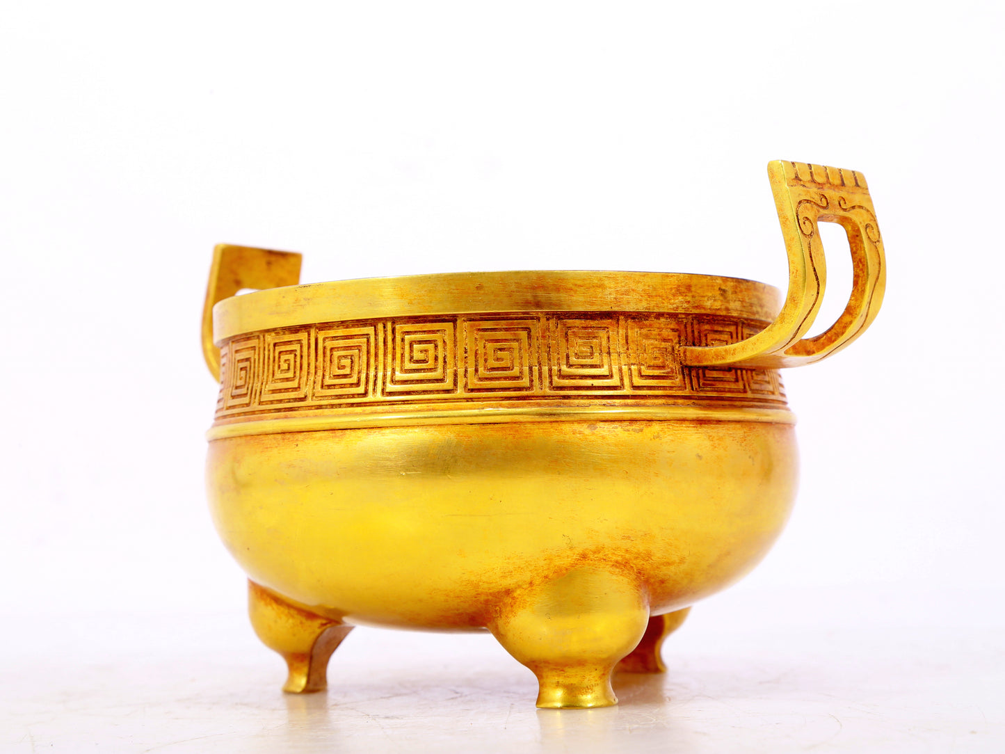 An exquisite gilt bronze censer with double ears and three legs