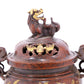 An exquisite gilt bronze double-eared and tripod censer with flower and bird patterns and lid