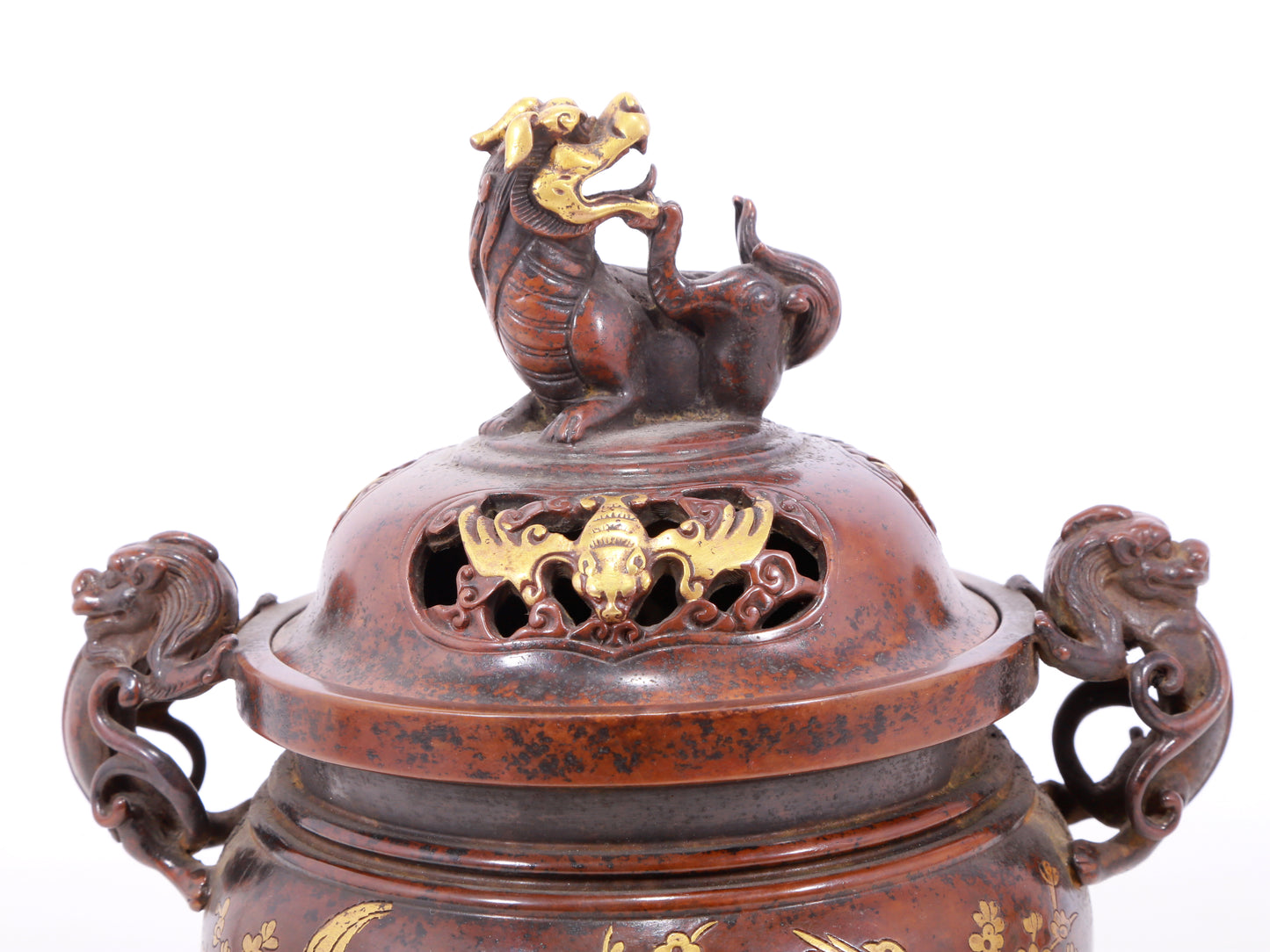 An exquisite gilt bronze double-eared and tripod censer with flower and bird patterns and lid