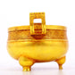 An exquisite gilt bronze censer with double ears and three legs