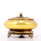 An exquisite gilt bronze censer with floral pattern and lid