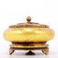 An exquisite gilt bronze censer with floral pattern and lid