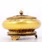 An exquisite gilt bronze censer with floral pattern and lid