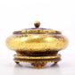 An exquisite gilt bronze censer with floral pattern and lid