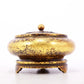 An exquisite gilt bronze censer with floral pattern and lid