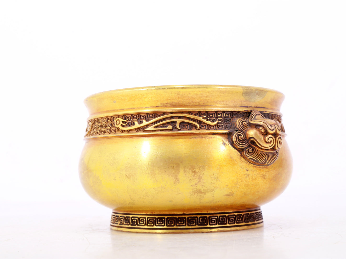 An exquisite gilt bronze lion-ear censer