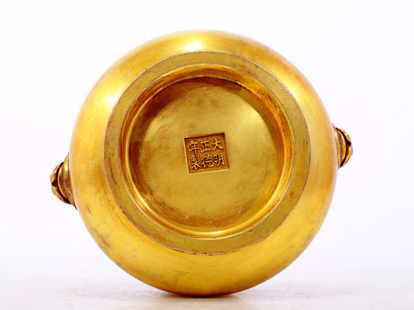 An exquisite gilt bronze lion-ear censer