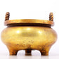 An exquisite gilt bronze censer with double ears and three legs