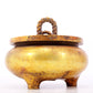 An exquisite gilt bronze censer with double ears and three legs