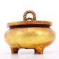 An exquisite gilt bronze censer with double ears and three legs