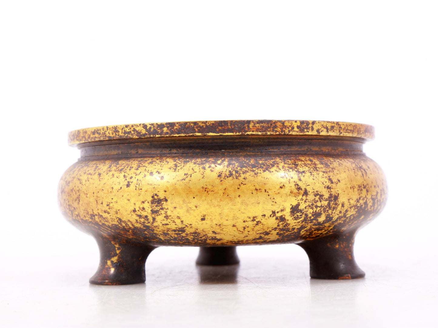 An exquisite gilt bronze tripod censer