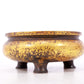 An exquisite gilt bronze tripod censer