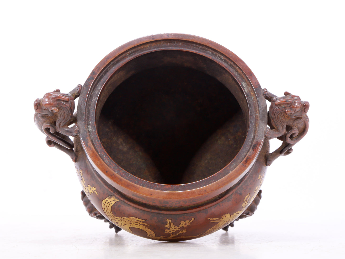 An exquisite gilt bronze double-eared and tripod censer with flower and bird patterns and lid