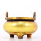 An exquisite gilt bronze censer with double ears and three legs