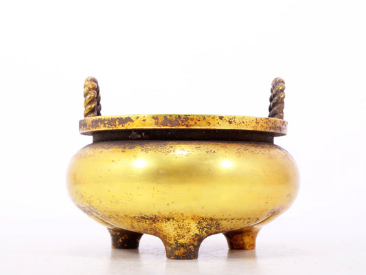 An exquisite gilt bronze censer with double ears and three legs