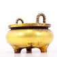 An exquisite gilt bronze censer with double ears and three legs