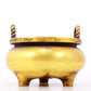 An exquisite gilt bronze censer with double ears and three legs