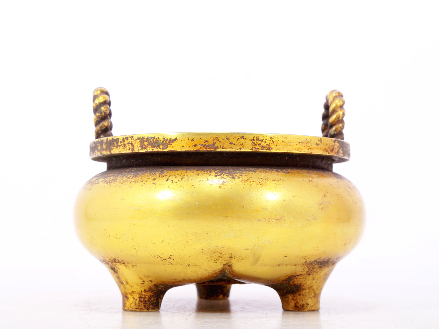 An exquisite gilt bronze censer with double ears and three legs