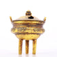 An exquisite gilt bronze censer with double ears and three legs with auspicious animal patterns and a lid