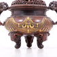 An exquisite gilt bronze elephant-patterned two-eared and tripod censer with lid