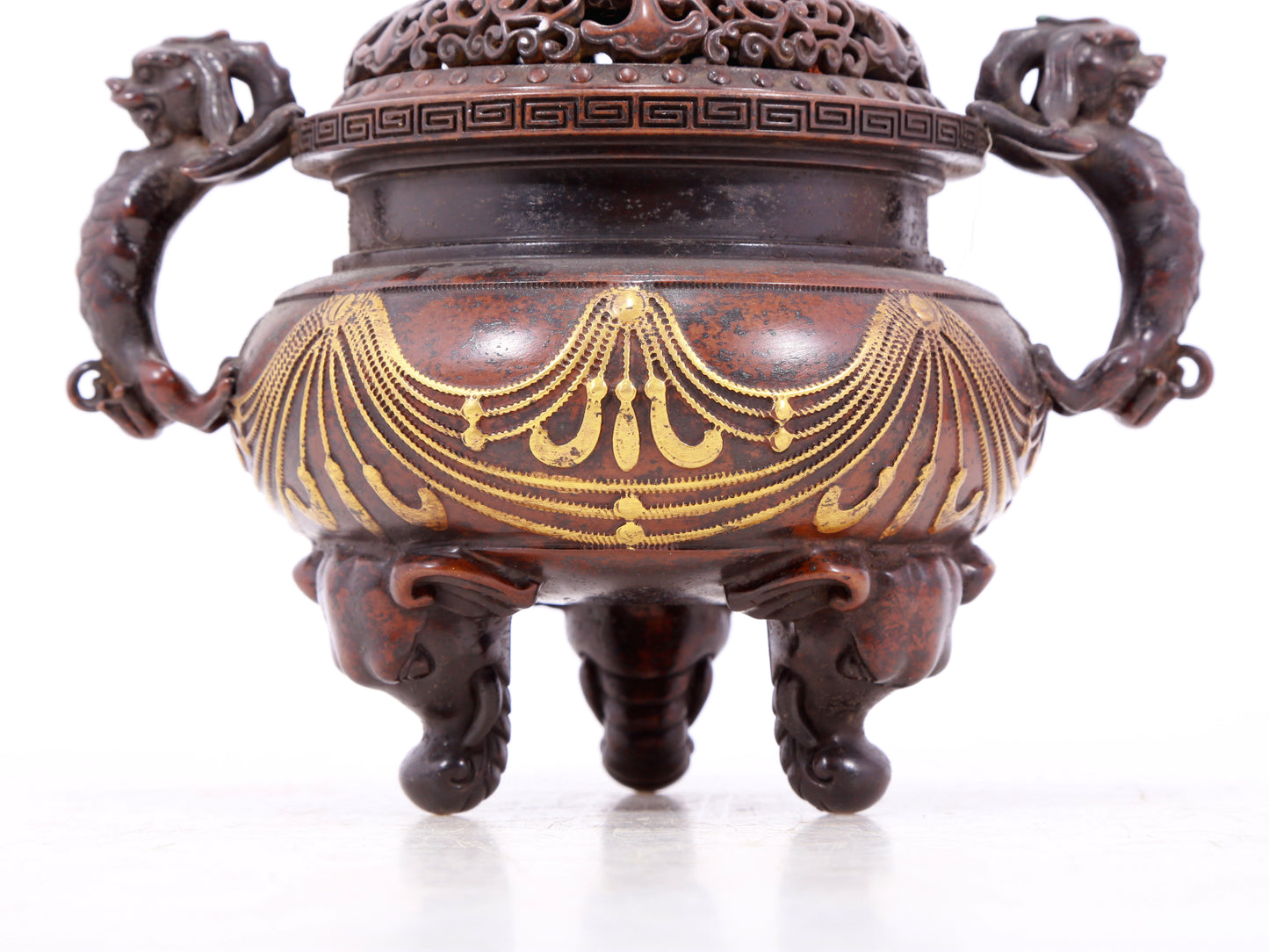 An exquisite gilt bronze elephant-patterned two-eared and tripod censer with lid