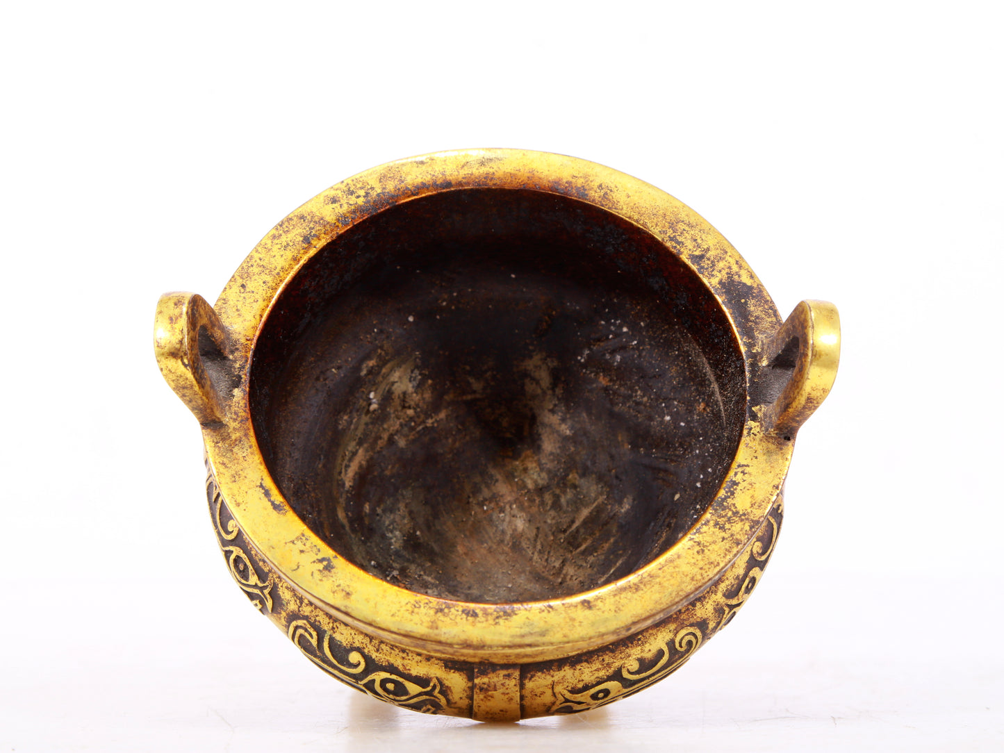 An exquisite gilt bronze censer with double ears and three legs with auspicious animal patterns and a lid