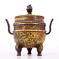 An exquisite gilt bronze dragon-patterned double-eared and tripod censer with lid