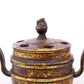 An exquisite gilt bronze dragon-patterned double-eared and tripod censer with lid