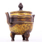 An exquisite gilt bronze dragon-patterned double-eared and tripod censer with lid