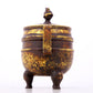 An exquisite gilt bronze dragon-patterned double-eared and tripod censer with lid