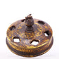 An exquisite gilt bronze dragon-patterned double-eared and tripod censer with lid