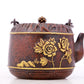 An exquisite gilt bronze teapot with floral patterns