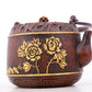 An exquisite gilt bronze teapot with floral patterns