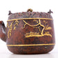 An exquisite gilt bronze teapot with floral patterns