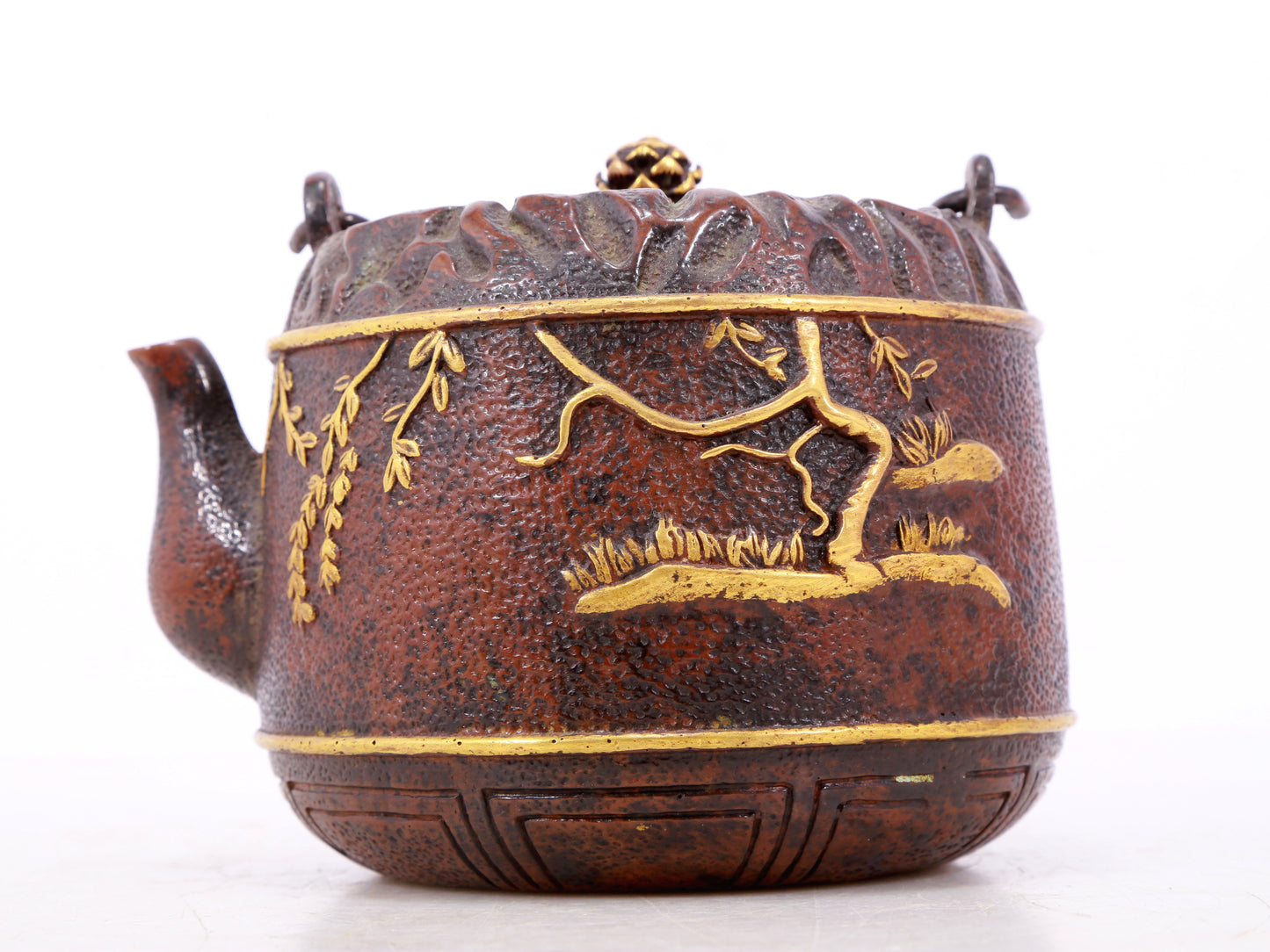 An exquisite gilt bronze teapot with floral patterns