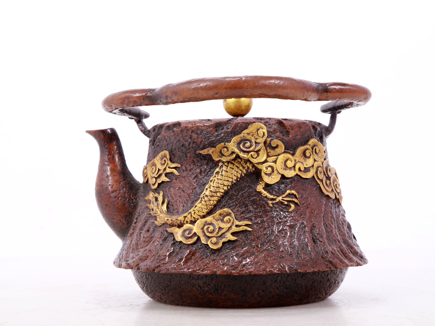 An exquisite gilt bronze teapot with auspicious clouds and dragon pattern