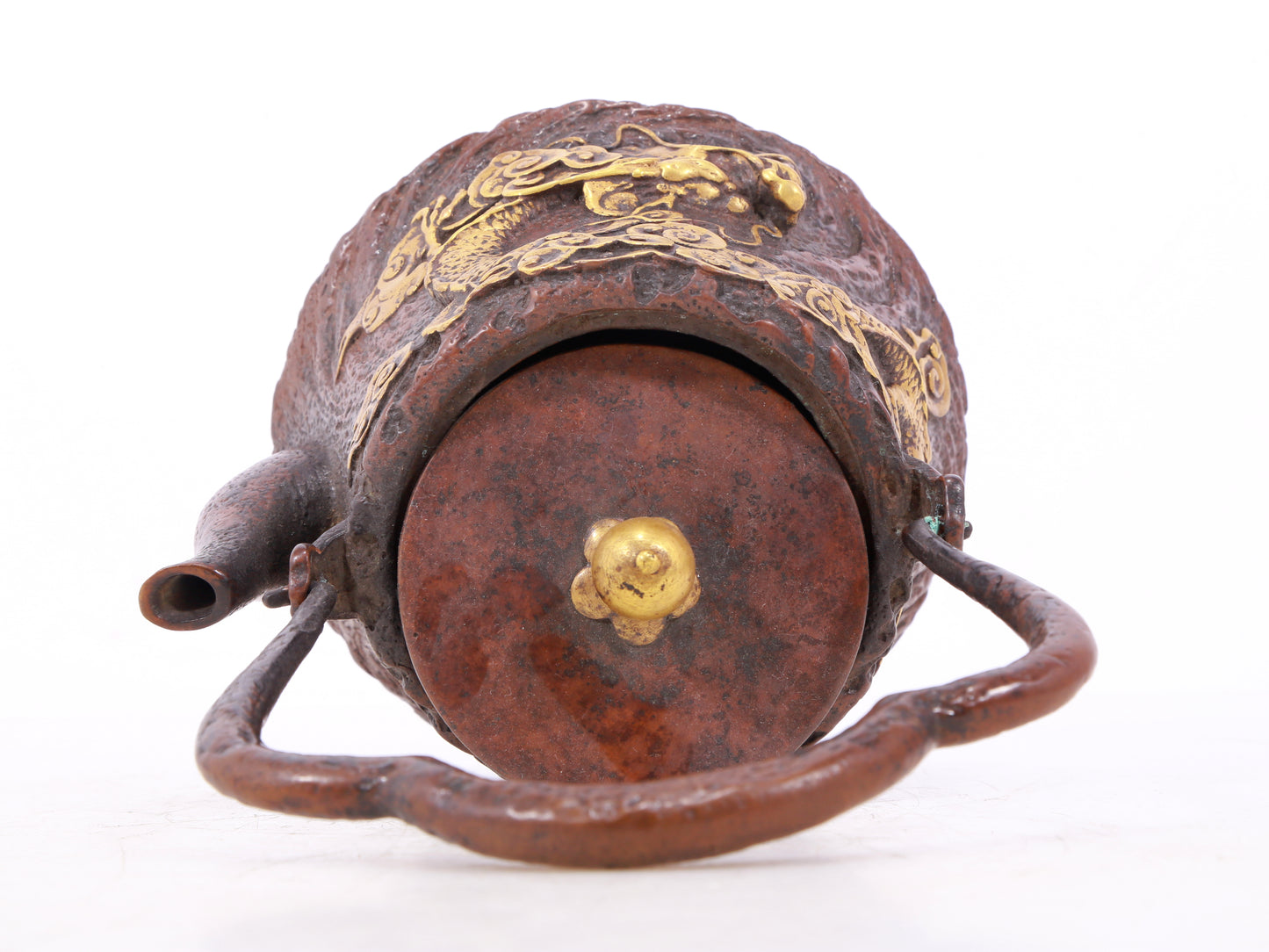 An exquisite gilt bronze teapot with auspicious clouds and dragon pattern