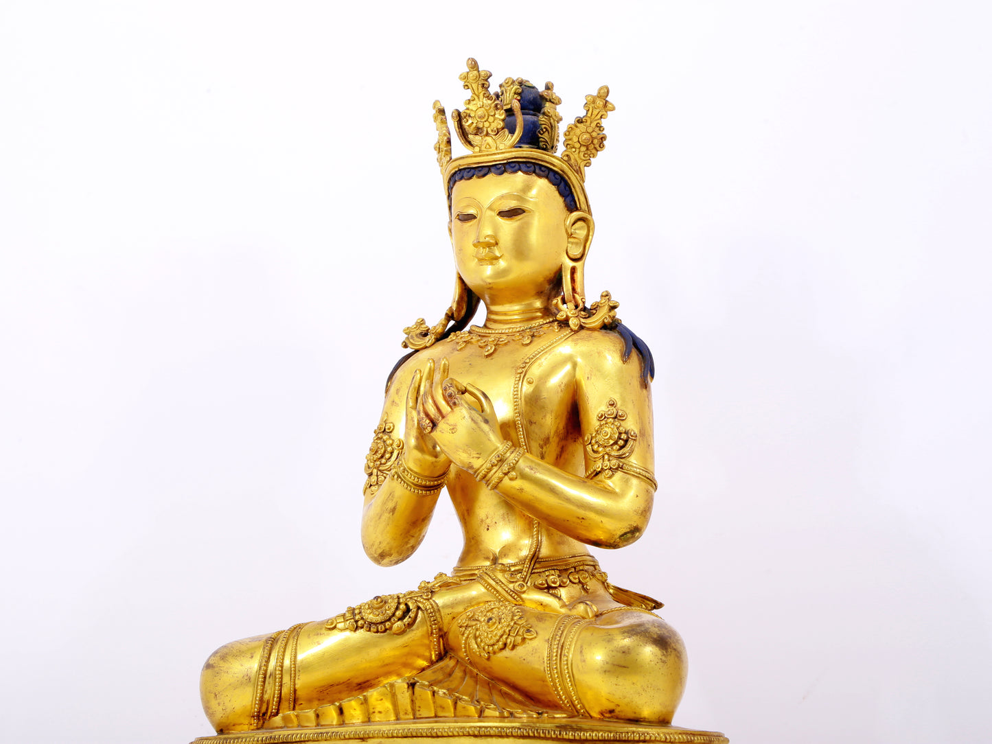 A solemn gilt bronze statue of Bodhisattva